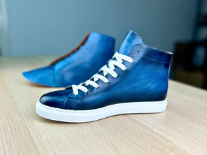 Blue leather handmade sneaker with white laces and sole – project from the VALEVRO shoemaking course.