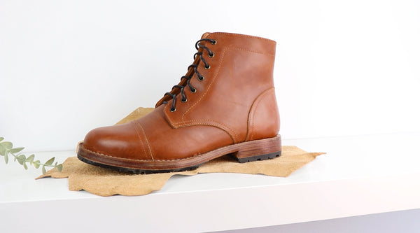 a brown leather ankle boot