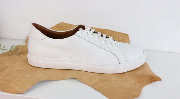 a white leather comfortable sneakers