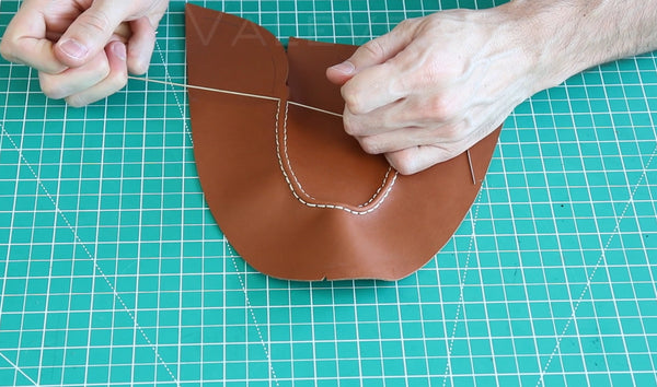 hand sewing upper with waxed thread in Valevro shoemaking course